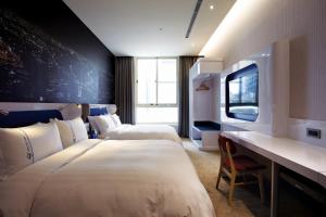 Postel nebo postele na pokoji v ubytování Airline Inn Green Park Way