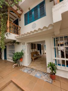 Rõdu või terrass majutusasutuses Casa del Puerto Hostel & Suites