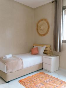 Postel nebo postele na pokoji v ubytování Flo Surf Morocco