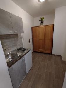 Kuchyň nebo kuchyňský kout v ubytování apartment-bb