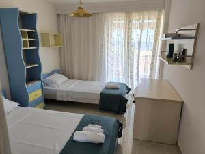 Postel nebo postele na pokoji v ubytování Tropico House