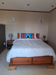 Vuode tai vuoteita majoituspaikassa LE BLANC HIDEAWAY