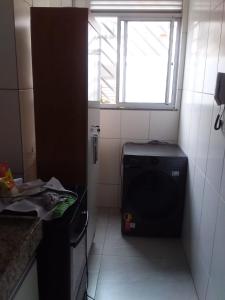 Kuchyň nebo kuchyňský kout v ubytování Apartamento compartilhado quarto com suite