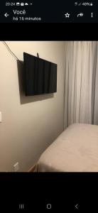 TV a/nebo společenská místnost v ubytování Apartamento compartilhado quarto com suite + 5 fotografií