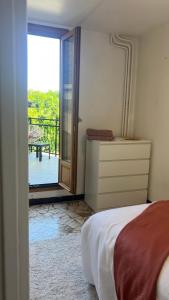 Postel nebo postele na pokoji v ubytování Appart Proche Orly