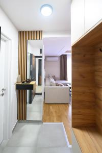 Кровать или кровати в номере Apartman North resort +18 фотографий