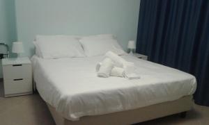 Posteľ alebo postele v izbe v ubytovaní B&b Bagheria