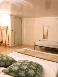 Postel nebo postele na pokoji v ubytování Hostal Síndigo