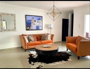 Posezení v ubytování Moderno Y Elegante apartamento con piscina