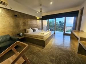 Postel nebo postele na pokoji v ubytování Serene Sands Villa