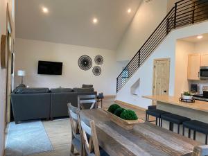 a living room with a couch and a table at Bearded Buffalo Resort in Custer
