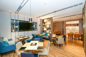Posezení v ubytování Echarm Hotel Guangzhou Dongpu Financial City Pazhou Convention Center - Free shuttle bus for Canton Fair