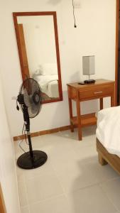 Postel nebo postele na pokoji v ubytování Orizaba Suites