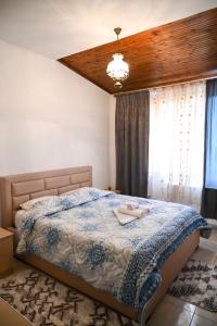 Postel nebo postele na pokoji v ubytování Joni Restaurant