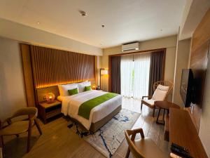 Voodi või voodid majutusasutuse Cebu One Tectona Resort Hotel toas