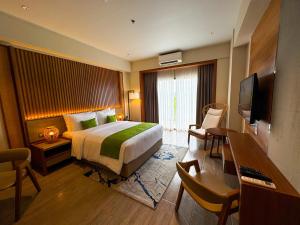 Voodi või voodid majutusasutuse Cebu One Tectona Resort Hotel toas