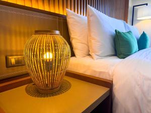 Voodi või voodid majutusasutuse Cebu One Tectona Resort Hotel toas