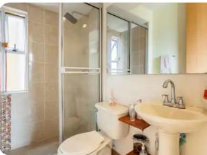 Vannituba majutusasutuses AlohaT Habitaciones