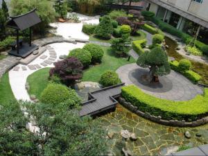 Zahrada ubytování Grand Land Hotel