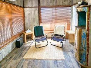 Posezení v ubytování Wonderlust Inn