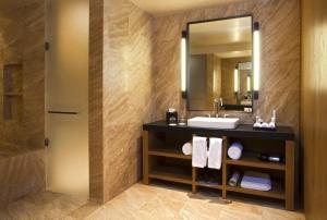 a bathroom with a sink and a mirror at JW Marriott Los Cabos Beach Resort & Spa in San Jos&eacute; del Cabo