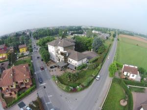 an aerial view of a house and a road at Hotel Gama in Melzo
