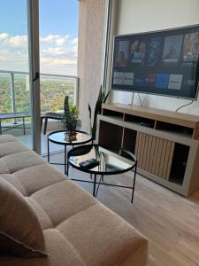 TV a/nebo společenská místnost v ubytování Piso 21, Vista Privilegiada, Forum Molas