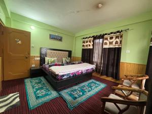 Ένα ή περισσότερα κρεβάτια σε δωμάτιο στο Pullkit Homestay by StayApart