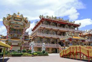 a building with a lot of decorations on it at One Beat Vintage&Bistro in Ban Puk (1)