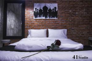 Ένα ή περισσότερα κρεβάτια σε δωμάτιο στο 41Studio