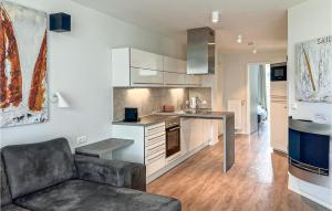 Kuchyň nebo kuchyňský kout v ubytování Dünenvilla 8, Whg 1