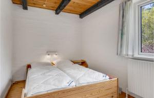 Voodi või voodid majutusasutuse 3 Bedroom Cozy Home In Bindslev toas