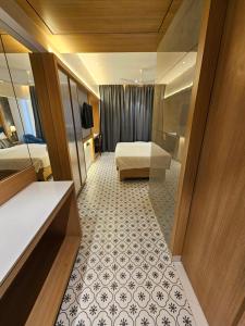 Postel nebo postele na pokoji v ubytování Hotel Golden Nest Thane