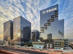 a group of tall buildings in a city at Lavande Hotel Shenzhen North Station Huawei Gangtou Metro Station in Tiantangwei
