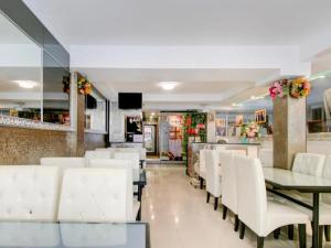 Istumisnurk majutusasutuses OYO 253 KK 11 Boutique Inn