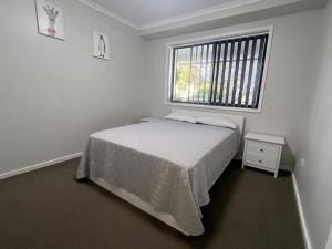 Ένα ή περισσότερα κρεβάτια σε δωμάτιο στο Jubilee Apartment 08 - Bring your own linen +10 φωτογραφίες