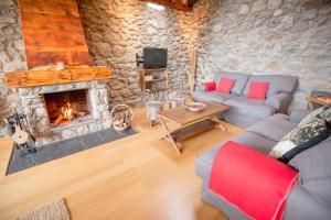 Predel za sedenje v nastanitvi R de rural - Borda del Mollà