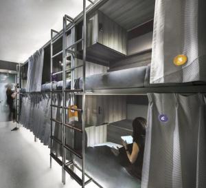 Μία ή περισσότερες κουκέτες σε δωμάτιο στο Coller Boutique Hostel