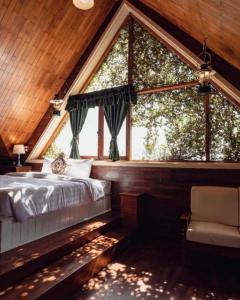 Postel nebo postele na pokoji v ubytování Dalat Old Market Town