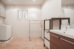 Koupelna v ubytování OHAYO Hotel 大森西