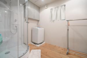 Koupelna v ubytování OHAYO Hotel 大森西