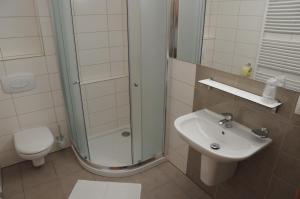 Koupelna v ubytování Hotel Kaskada