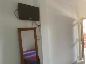 TV a/nebo společenská místnost v ubytování Surf reef beach