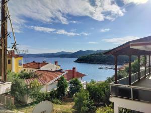 a view of a body of water from a building at Pyrgadikia 1BR Welcome stay Private Holiday House in Chalkidiki - Sithonia in Pyrgadikia