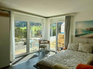 Postel nebo postele na pokoji v ubytování Chez Svanette B&B Villa Sonnglück