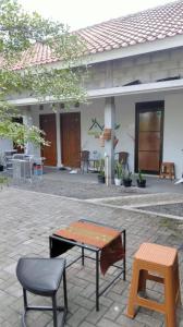 Патио или другая зона на открытом воздухе в Homestay Rumah Bahagia Cepor