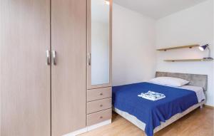 Ein Bett oder Betten in einem Zimmer der Unterkunft Amazing Home In Icici
