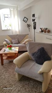 Ein Sitzbereich in der Unterkunft Ferienwohnung Itzgrundruhe
