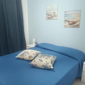 Postel nebo postele na pokoji v ubytování Sole e mare