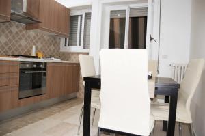 A kitchen or kitchenette at Vatican In The Moonlight Apartment